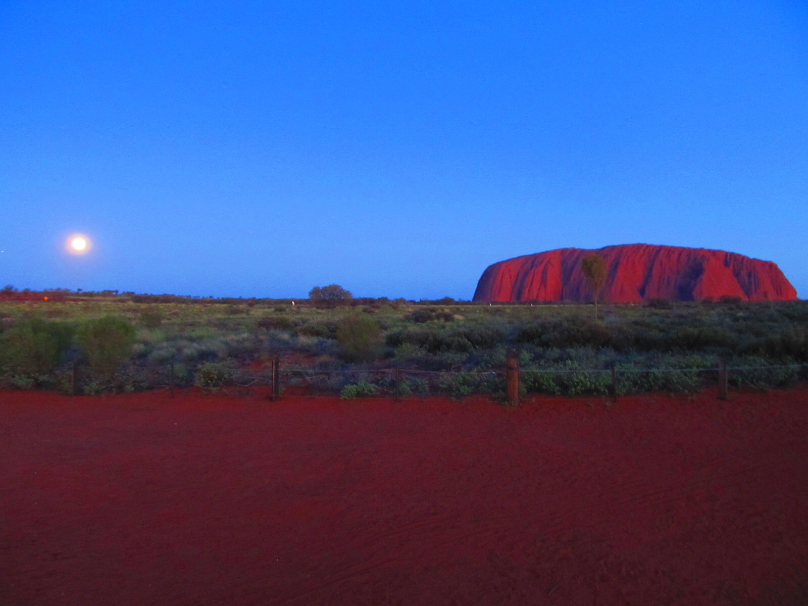Full moon rising at Uluru sunset